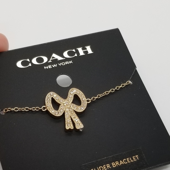 NWT Coach pave bow slider bracelet gold and clear - Picture 2 of 3